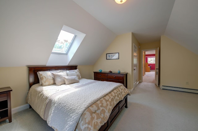 11 Washington Ct, Naples, ME 04055 - bedroom with a baseboard radiator, light carpet, vaulted ceiling, and a skylight