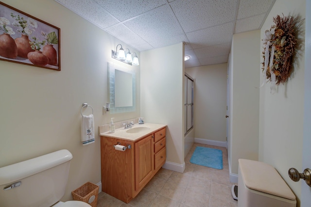 11 Washington Ct, Naples, ME 04055 - full bathroom featuring vanity, a drop ceiling, tile patterned flooring, and enclosed tub / shower combo