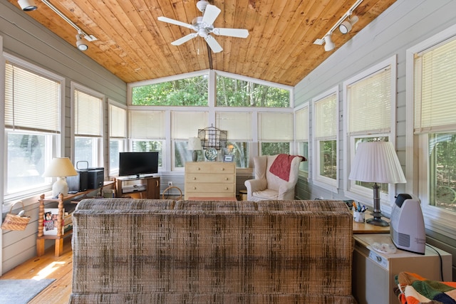 23 Laurel Pines Dr, Gorham, ME 04038 - sunroom with rail lighting, lofted ceiling, wood finished floors, wood ceiling, and wood walls