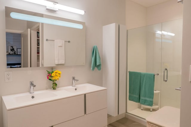 167 Newbury St Unit 206, Portland, ME 04101 - bathroom with a stall shower and double vanity