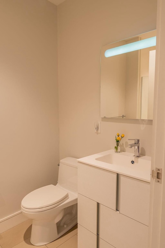 167 Newbury St Unit 206, Portland, ME 04101 - half bathroom with vanity and tile patterned floors