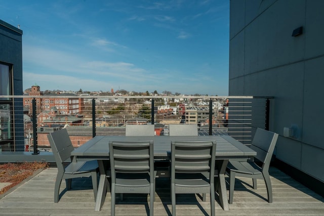 167 Newbury St Unit 206, Portland, ME 04101 - wooden deck featuring outdoor dining area
