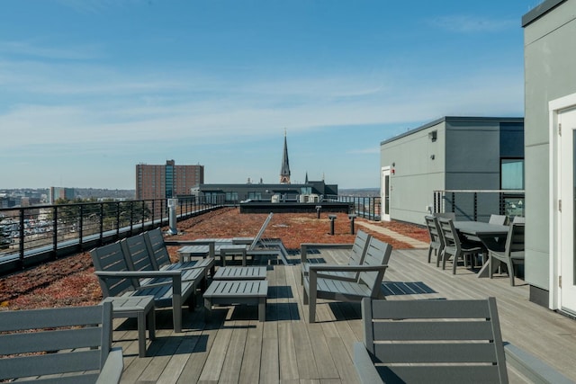 167 Newbury St Unit 206, Portland, ME 04101 - wooden deck featuring outdoor dining space