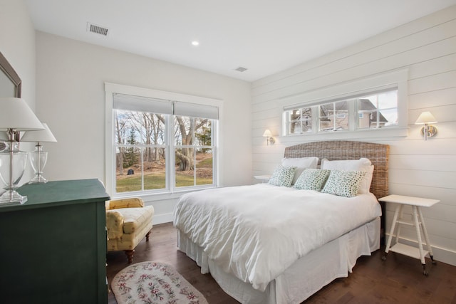 126 Mile Stretch Rd, Biddeford, ME 04005 - bedroom with dark wood-style flooring, wooden walls, and recessed lighting
