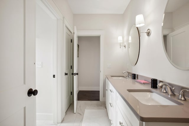 126 Mile Stretch Rd, Biddeford, ME 04005 - bathroom featuring marble finish flooring and double vanity