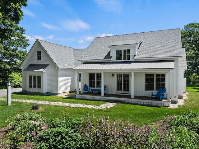 126 Mile Stretch Rd, Biddeford, ME 04005 - view of front of home featuring a standing seam roof, covered porch, roof with shingles, and board and batten siding