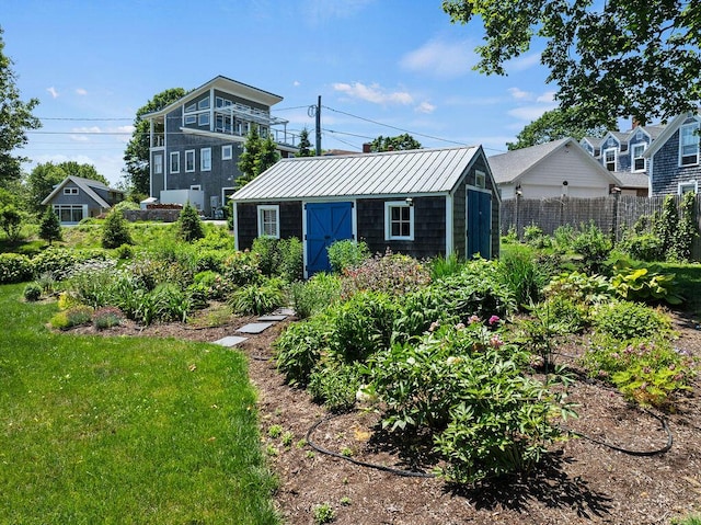 126 Mile Stretch Rd, Biddeford, ME 04005 - view of front of property featuring a storage unit and a metal roof