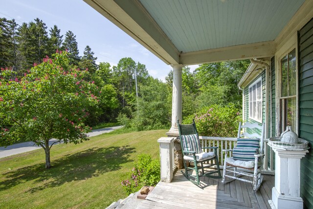 115 Babbidge Rd, Islesboro, ME 04848 - wooden terrace with a lawn