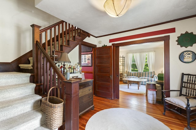 115 Babbidge Rd, Islesboro, ME 04848 - stairs with wood finished floors and ornamental molding