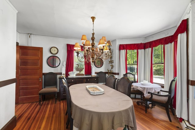 115 Babbidge Rd, Islesboro, ME 04848 - dining area with a chandelier and wood finished floors