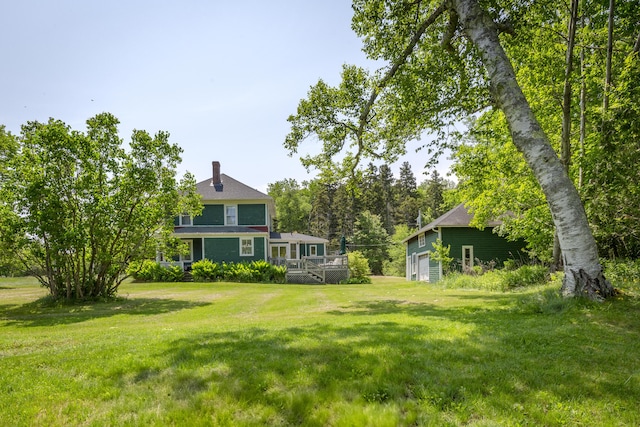 115 Babbidge Rd, Islesboro, ME 04848 - view of grassy yard with a deck