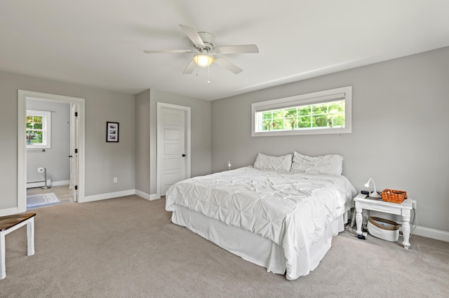 3 Ethan Way, Gray, ME 04039 - carpeted bedroom with a baseboard heating unit, multiple windows, and ceiling fan