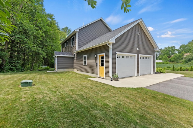 3 Ethan Way, Gray, ME 04039 - view of home's exterior featuring driveway, a garage, a lawn, and roof with shingles
