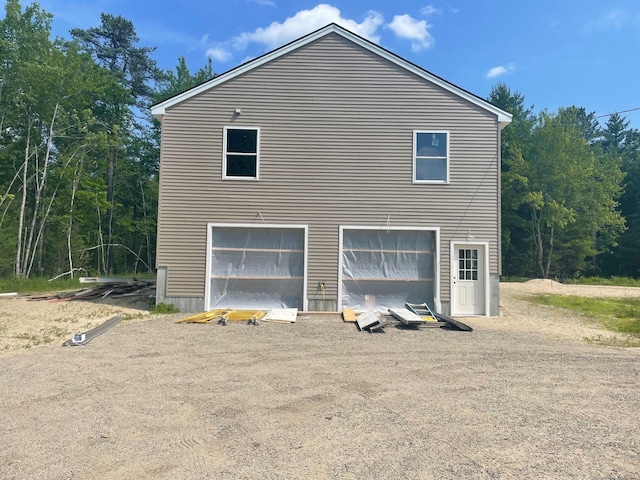 585 Newfield Rd, Shapleigh, ME 04076 - view of side of property featuring a garage and driveway