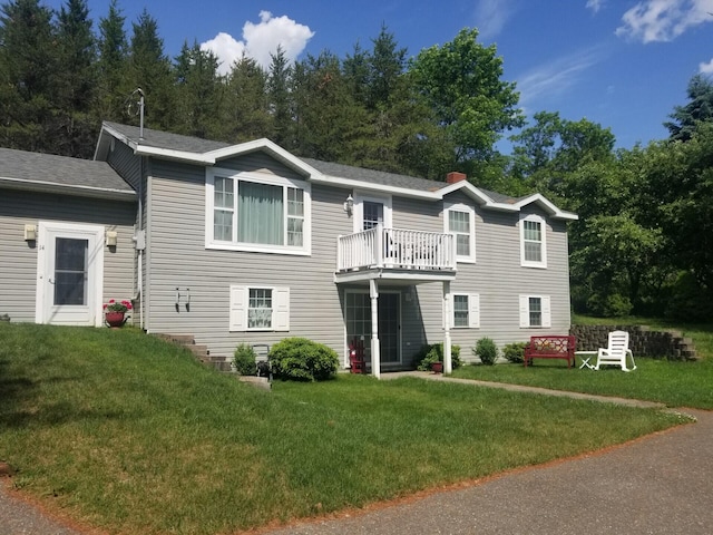 14 Reach Rd, Presque Isle, ME 04769 - view of front of home featuring a front yard and a chimney