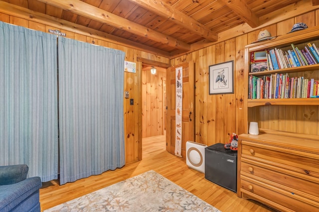 221 Gates Rd, Jefferson, ME 04348 - living area with a wooden ceiling with exposed beams, wood walls, and light wood-style floors