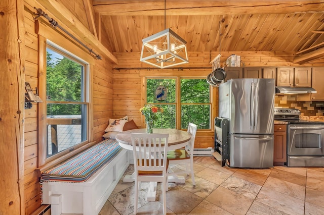221 Gates Rd, Jefferson, ME 04348 - dining room with wood ceiling, wood walls, and a baseboard heating unit