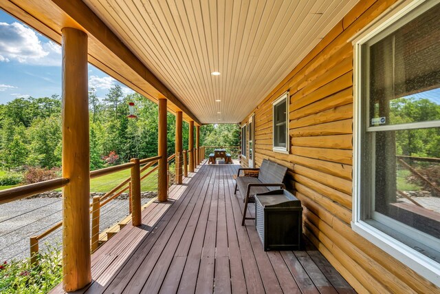 221 Gates Rd, Jefferson, ME 04348 - porch featuring view of scattered trees