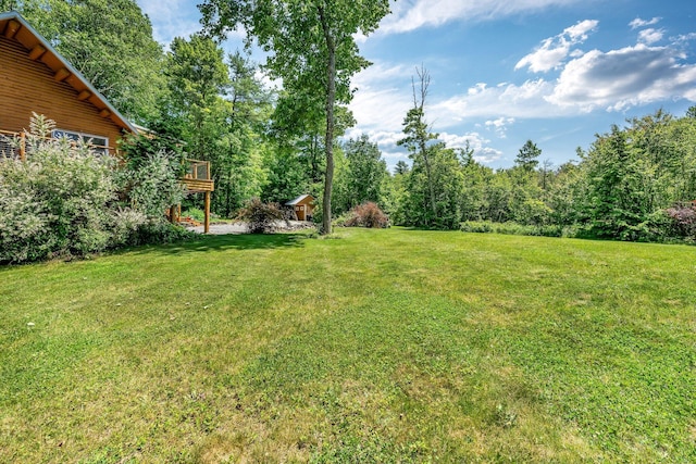 221 Gates Rd, Jefferson, ME 04348 - view of grassy yard with a deck
