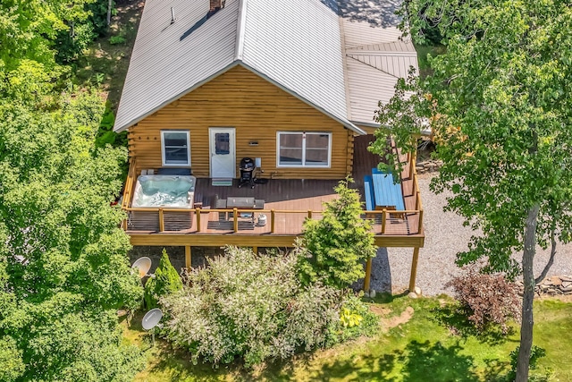 221 Gates Rd, Jefferson, ME 04348 - rear view of property with a wooden deck and log siding