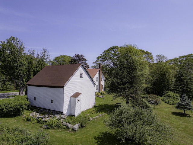 878 State Route 32, Bristol, ME 04564 - view of home's exterior with a chimney and a yard