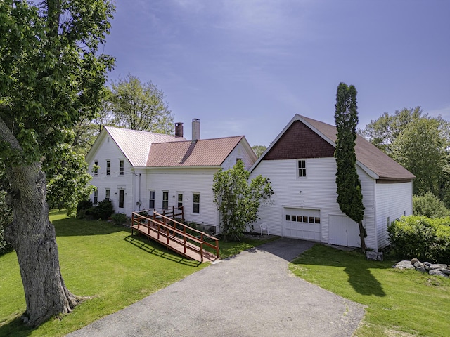 878 State Route 32, Bristol, ME 04564 - view of front facade with driveway, a chimney, a front lawn, and a deck