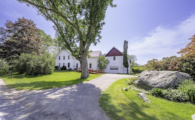 878 State Route 32, Bristol, ME 04564 - view of front of property featuring gravel driveway, an attached garage, and a front yard