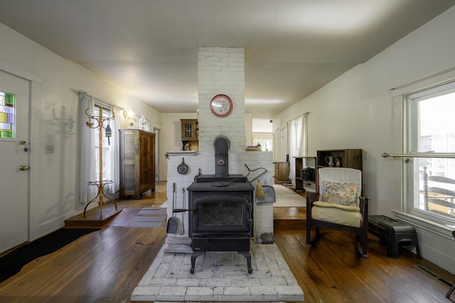878 State Route 32, Bristol, ME 04564 - living room featuring hardwood / wood-style flooring and a wood stove