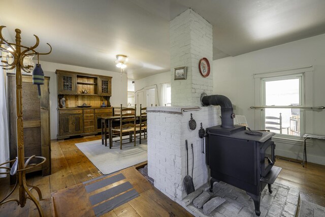 878 State Route 32, Bristol, ME 04564 - living room featuring a wood stove and hardwood / wood-style floors