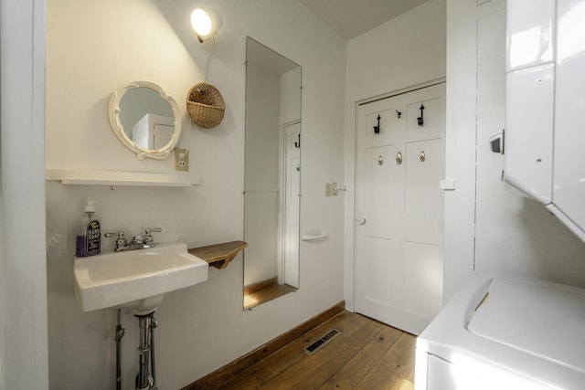 878 State Route 32, Bristol, ME 04564 - bathroom featuring hardwood / wood-style flooring