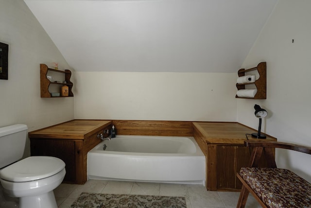 878 State Route 32, Bristol, ME 04564 - bathroom featuring vaulted ceiling, a bath, and tile patterned floors