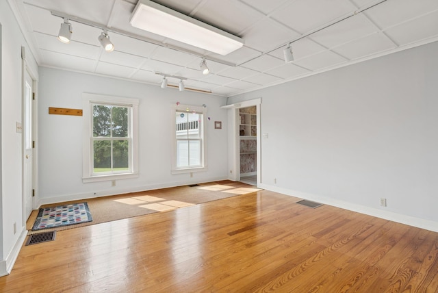 428 Webbs Mills Rd, Raymond, ME 04071 - unfurnished room featuring track lighting and wood finished floors