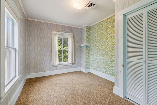428 Webbs Mills Rd, Raymond, ME 04071 - empty room with crown molding, wallpapered walls, and carpet