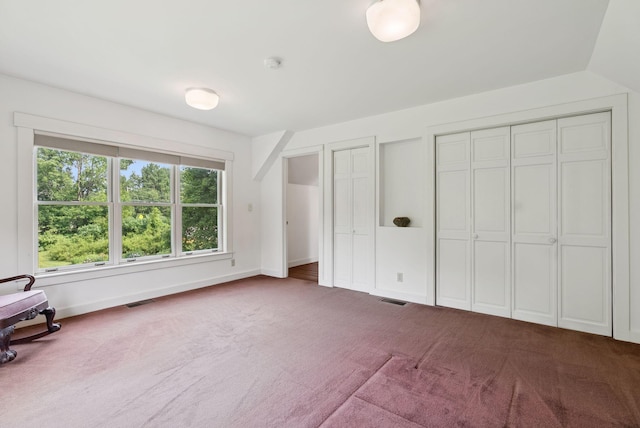 428 Webbs Mills Rd, Raymond, ME 04071 - unfurnished bedroom with carpet and two closets