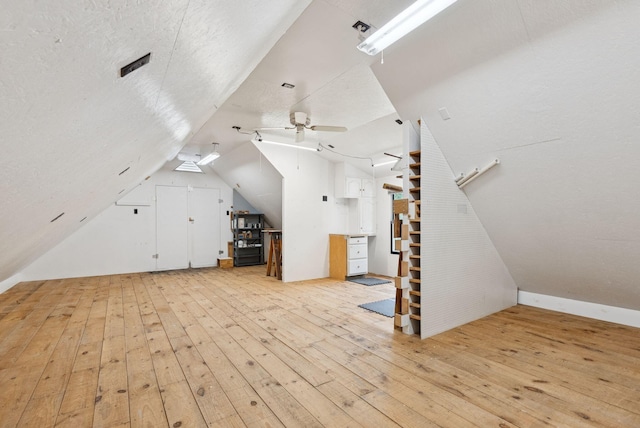 428 Webbs Mills Rd, Raymond, ME 04071 - bonus room featuring light wood-type flooring, ceiling fan, and lofted ceiling