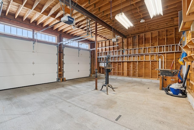 428 Webbs Mills Rd, Raymond, ME 04071 - garage featuring a garage door opener