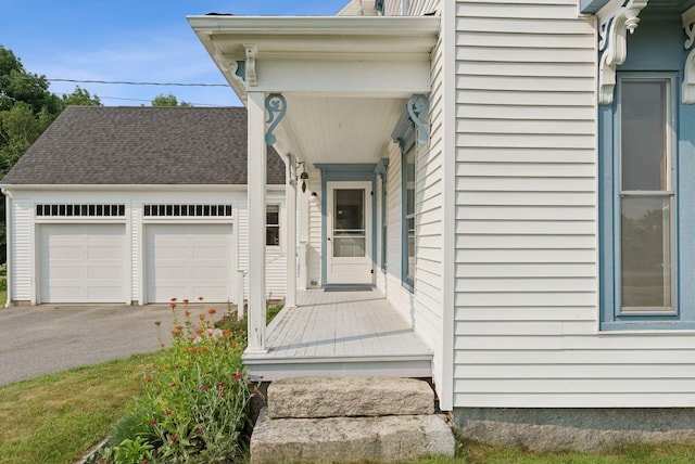 428 Webbs Mills Rd, Raymond, ME 04071 - doorway to property featuring an attached garage and driveway