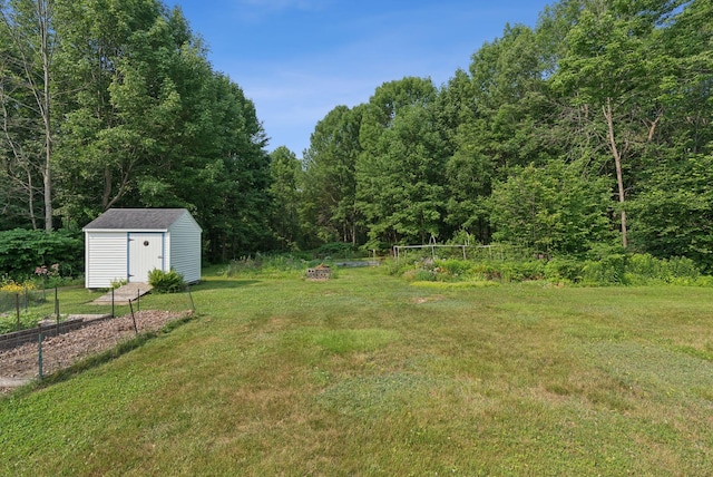 428 Webbs Mills Rd, Raymond, ME 04071 - view of yard featuring a shed and a view of trees