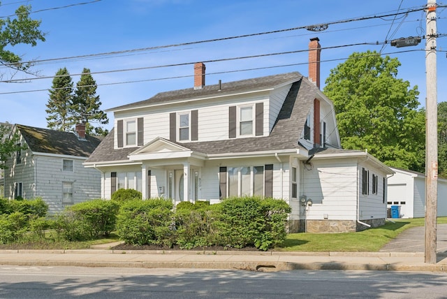 930 Forest Ave, Portland, ME 04103 - colonial inspired home featuring a shingled roof and a chimney