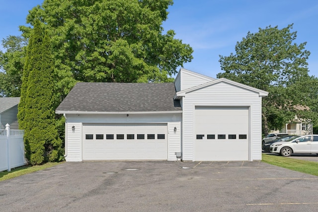 930 Forest Ave, Portland, ME 04103 - view of front of home featuring roof with shingles, an attached garage, and driveway