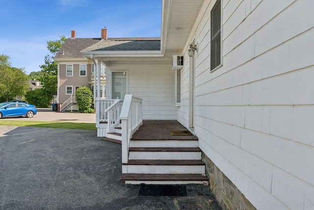 930 Forest Ave, Portland, ME 04103 - entrance to property featuring a chimney and roof with shingles