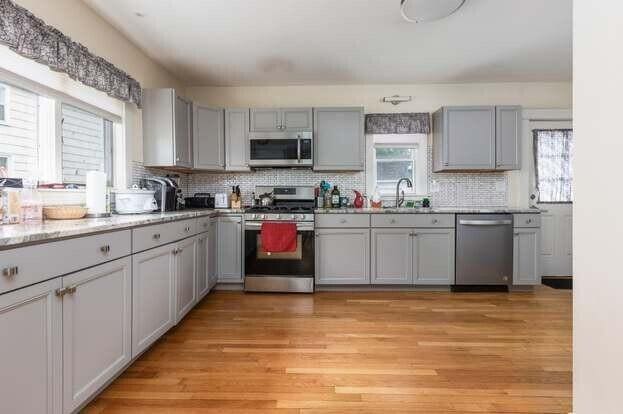 930 Forest Ave, Portland, ME 04103 - kitchen featuring appliances with stainless steel finishes and gray cabinets