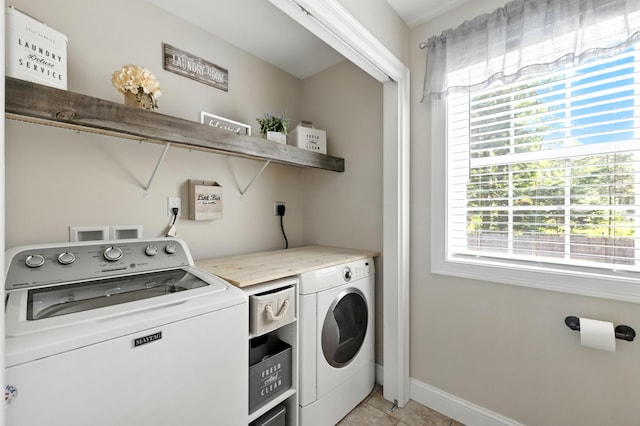 50 Carlisle Ln, Wells, ME 04090 - laundry room with washing machine and dryer and light tile patterned floors