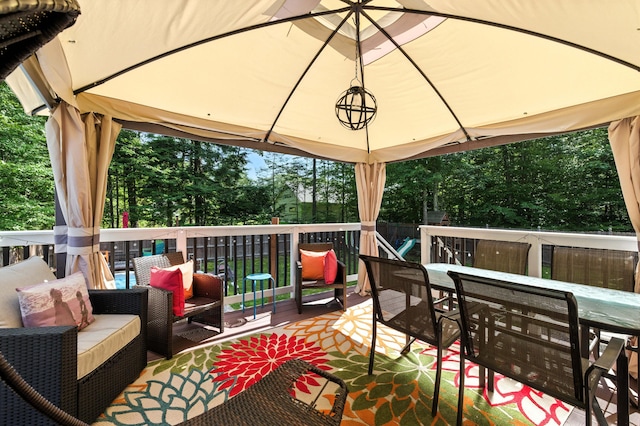 50 Carlisle Ln, Wells, ME 04090 - deck with outdoor dining space and outdoor lounge area