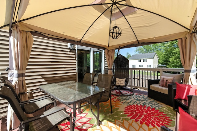 50 Carlisle Ln, Wells, ME 04090 - wooden terrace featuring a gazebo, an outdoor hangout area, and outdoor dining space