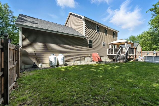 50 Carlisle Ln, Wells, ME 04090 - back of property featuring a gazebo, a fenced backyard, and a shingled roof