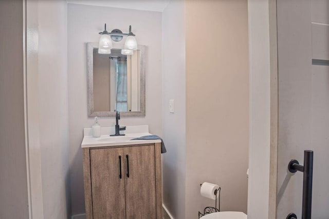 42 Winn Rd, Falmouth, ME 04105 - half bath featuring toilet and vanity