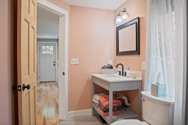 42 Winn Rd, Falmouth, ME 04105 - bathroom with vanity and wood finished floors