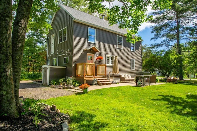 42 Winn Rd, Falmouth, ME 04105 - rear view of house featuring a patio area, a yard, and roof with shingles