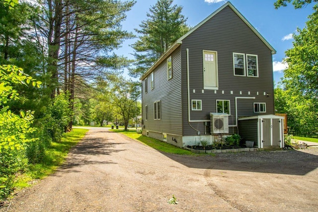 42 Winn Rd, Falmouth, ME 04105 - view of home's exterior featuring dirt driveway and a shed